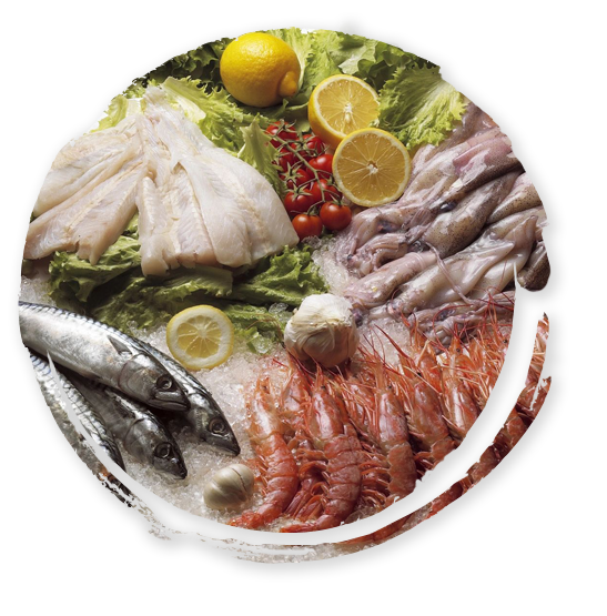 A round picture of fish and vegetables on the table.